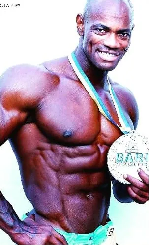 Antony Bessala showing the Bari silver medal